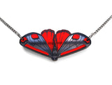 cinnabar moth necklace close up.
