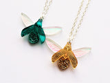 gold and teal glitter bug pendants
