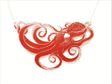 Double sided acrylic octopus necklace, red side.