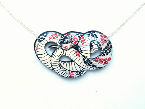.gif of all the snake necklaces 