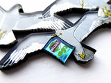 seagull necklace with walkers cheese and onion crisps