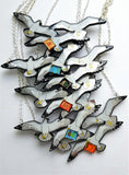 All six variations of the seagull necklace