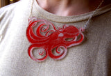 Double sided acrylic octopus necklace, red side.