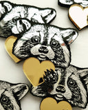 multiple raccoon pendants 